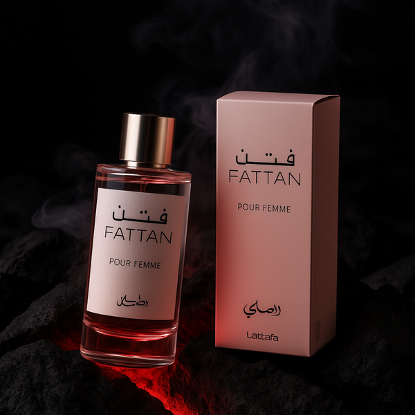 Rasasi Fattan Women Eau de Parfum 50ml bottle, elegant floral fragrance with gold accents, sleek design, and clear glass packaging.