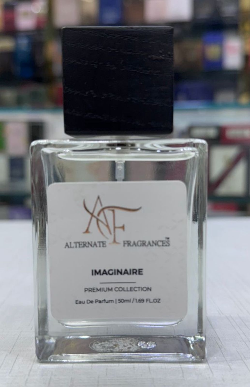 Image of Rini Deals Imaginaire For Men, a stylish fragrance bottle with sleek design and elegant branding.