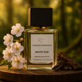White Oud EDP perfume bottle by Rini Deals, featuring a sleek white design and elegant packaging.