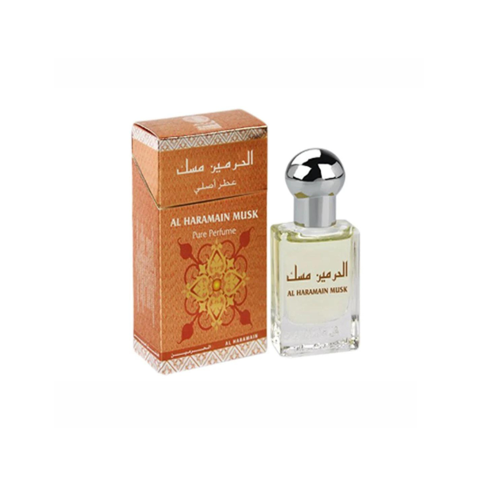 Al Haramain Musk Pure Attar perfume roll-on bottle for men and women, 15ml, featuring a sleek design and aromatic fragrance.