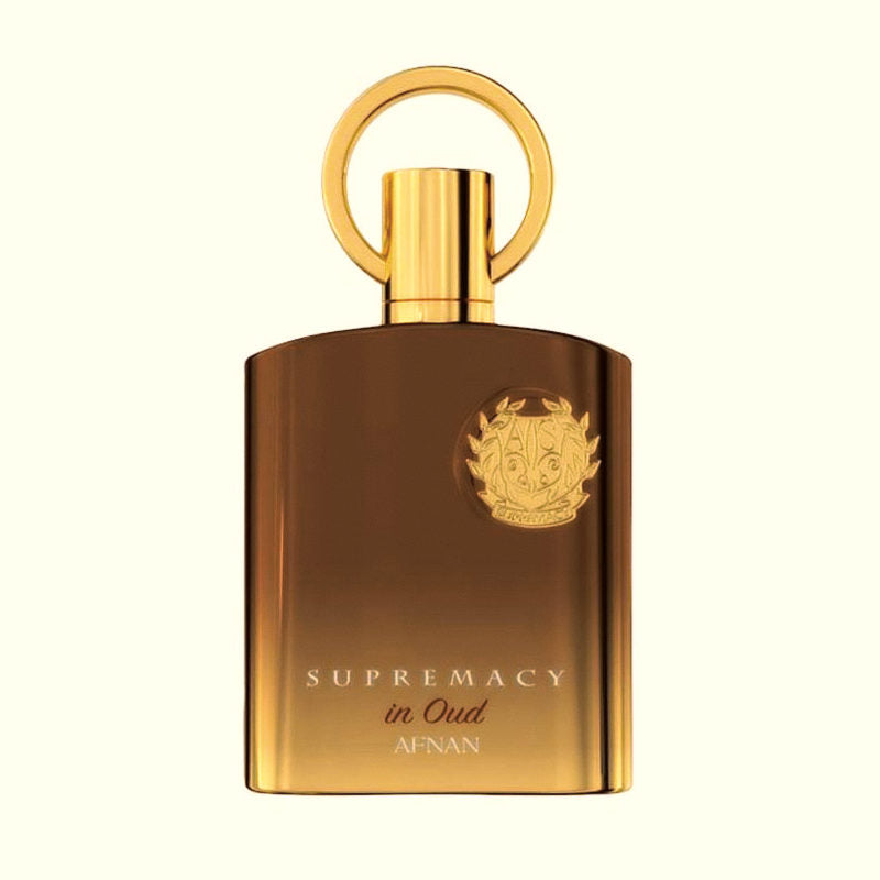 Afnan Supremacy in Oud unisex Eau de Parfum bottle with elegant packaging and fragrance notes visible.