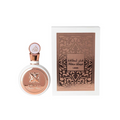 Lattafa Fakhar Women Edp 100ml perfume bottle with elegant design and clear branding visible.
