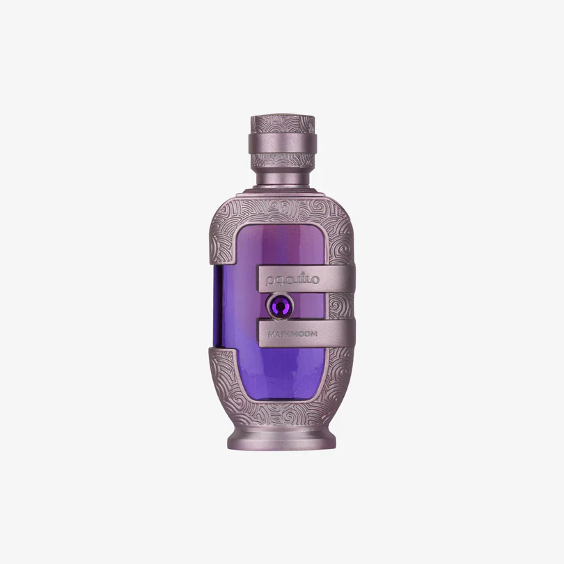 Lattafa Mashmoon perfume oil (Attar) 20ml for men and women, featuring a clear glass bottle with a black cap and elegant design.