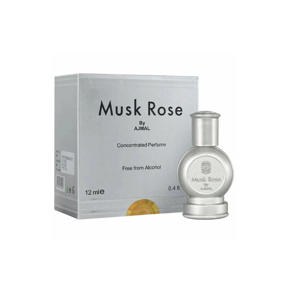Ajmal Musk Rose concentrated perfume oil for men and women, featuring a clear glass bottle with a silver cap and pink rose design.