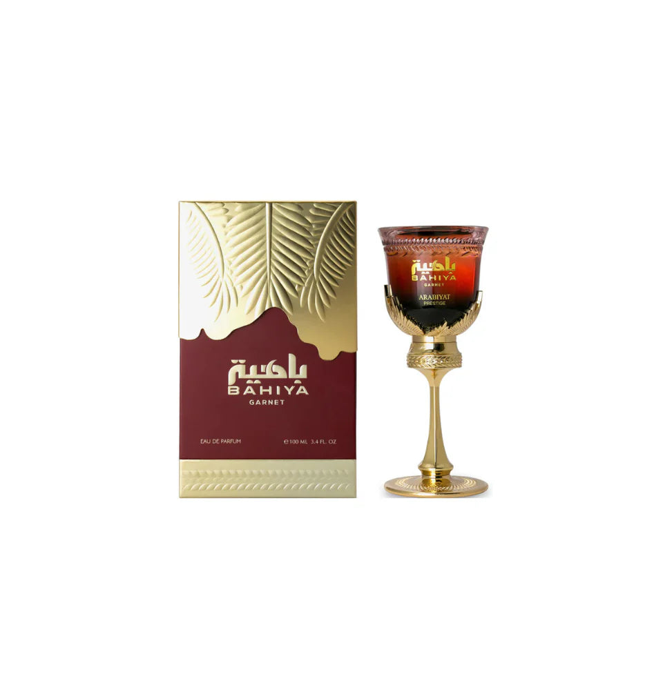 Arabiyat Prestige Bahiya Garnet Eau de Parfum 100ml for women, featuring a sleek glass bottle with a deep red hue and elegant cap.