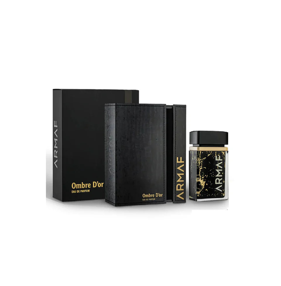 Armaf Ombre D'Or Eau De Parfum bottle for men and women, 100ml, elegant glass container with gold accents.