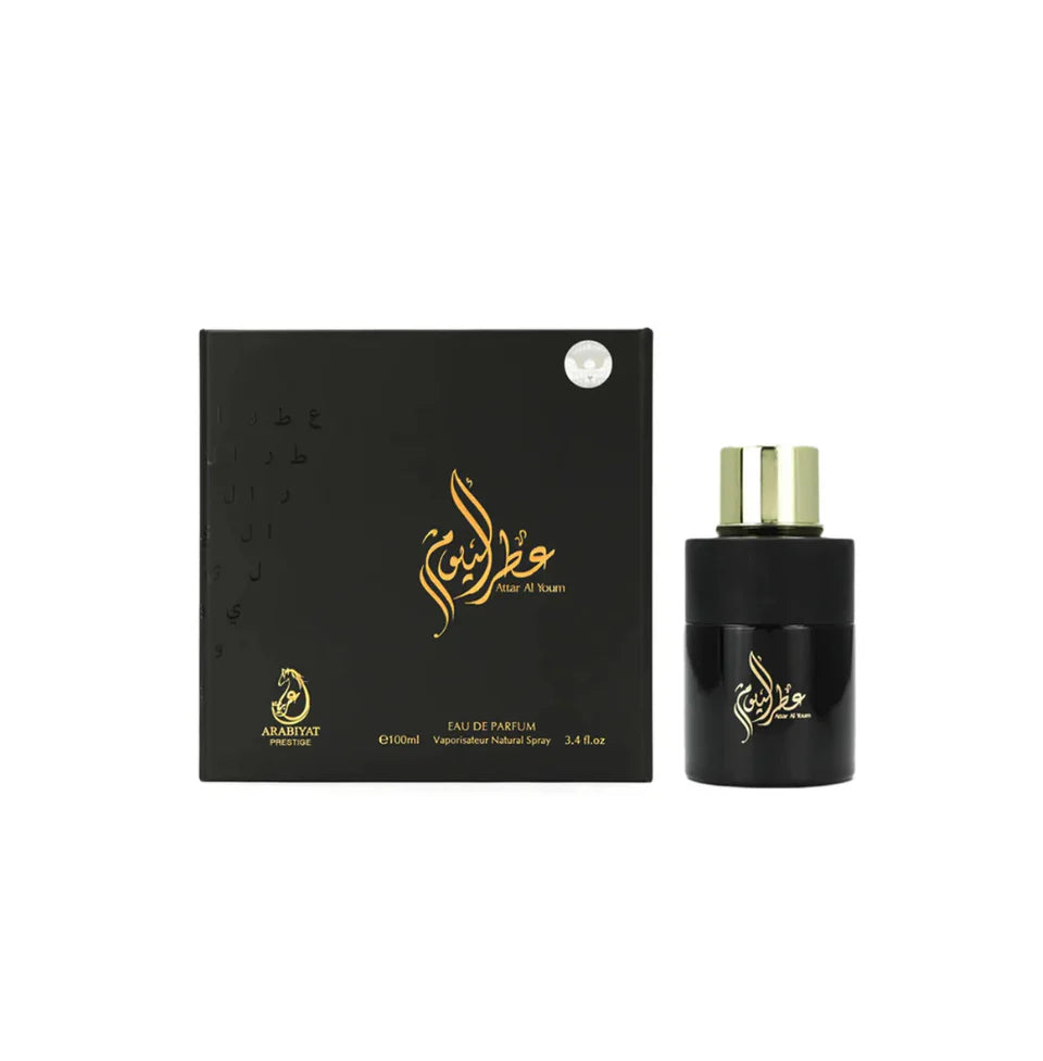 Arabiyat Prestige Attar Al Youm Black Eau De Parfum 100ml bottle for men and women, elegant black packaging and spray nozzle.