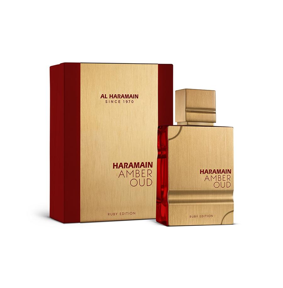 Al Haramain Amber Oudh Ruby Edition 60ml perfume bottle for men and women, with a deep red liquid and elegant packaging.