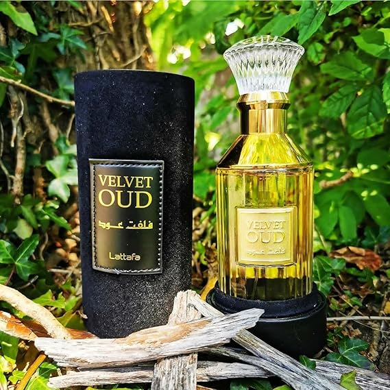 Lattafa Velvet Oud Edp 100ml bottle with elegant black and gold packaging, showcasing the luxurious fragrance.