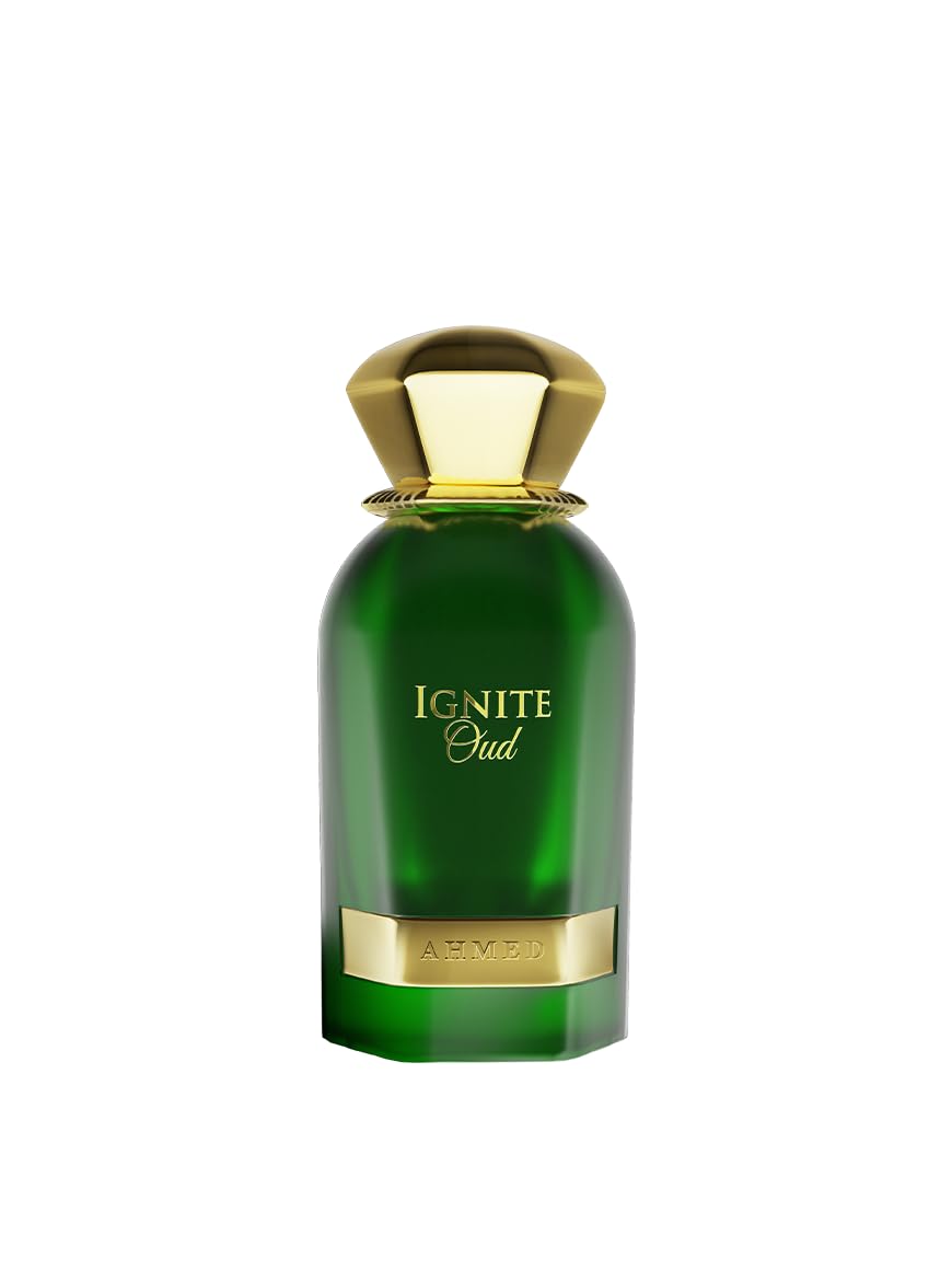 A green AHMED AL MAGHRIBI IGNITE OUD EAU DE PARFUM 60ML bottle for men & women with a gold cap and accents, labeled in gold, is pictured against a plain white background.