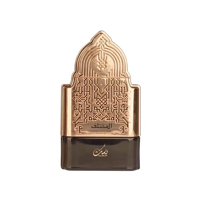 Nusuk Al Mukhtalif Signature men's perfume bottle, 100ml, with elegant design and fragrance details visible.