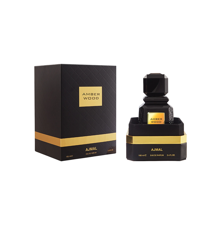 Ajmal Amber Wood Eau De Perfume 100ML for men and women, featuring a sleek glass bottle with amber-colored liquid.
