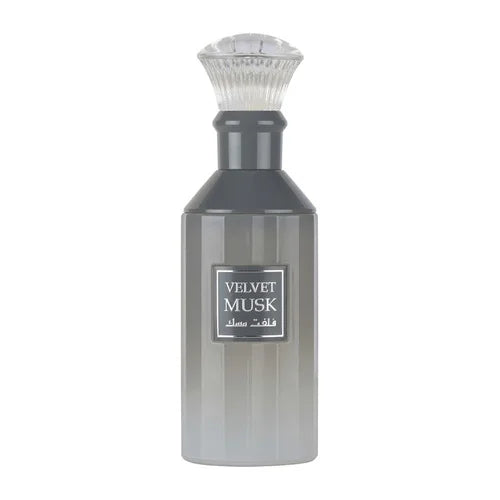 Lattafa Velvet Musk perfume bottle, 100ml for men and women, elegant glass design with a silver cap.