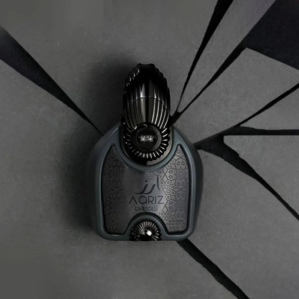 Arabiyat Prestige Aariz L'Absolu Eau De Parfum 100ml for men, featuring a sleek bottle design and elegant fragrance visual.