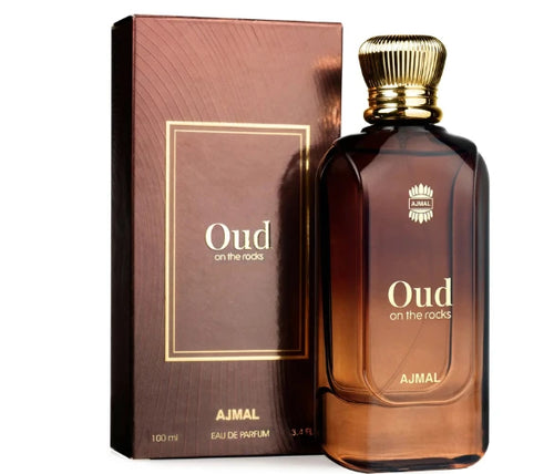 Ajmal Oud On The Rocks unisex fragrance bottle with elegant design and dark amber liquid inside.