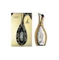 Arabiyat Prestige Kohl Luminous Eau De Parfum 100ml bottle for men and women, elegant glass container with a sleek design.