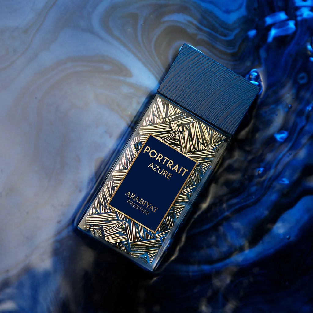 Arabiyat Prestige Portrait Azure Eau De Parfum 80ml bottle for men and women, elegant glass container with a sleek blue design.
