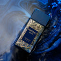 Arabiyat Prestige Portrait Azure Eau De Parfum 80ml bottle for men and women, elegant glass container with a sleek blue design.