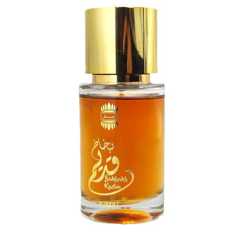 Ajmal Bakhakh Kadim Eau De Parfum bottle for men and women, elegant glass container with gold accents, on a neutral background.