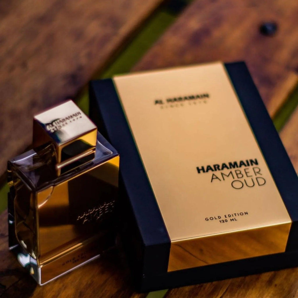 Al Haramain Amber Oud Gold Edition perfume bottle for men and women, 100ml, elegant gold and amber-colored packaging.