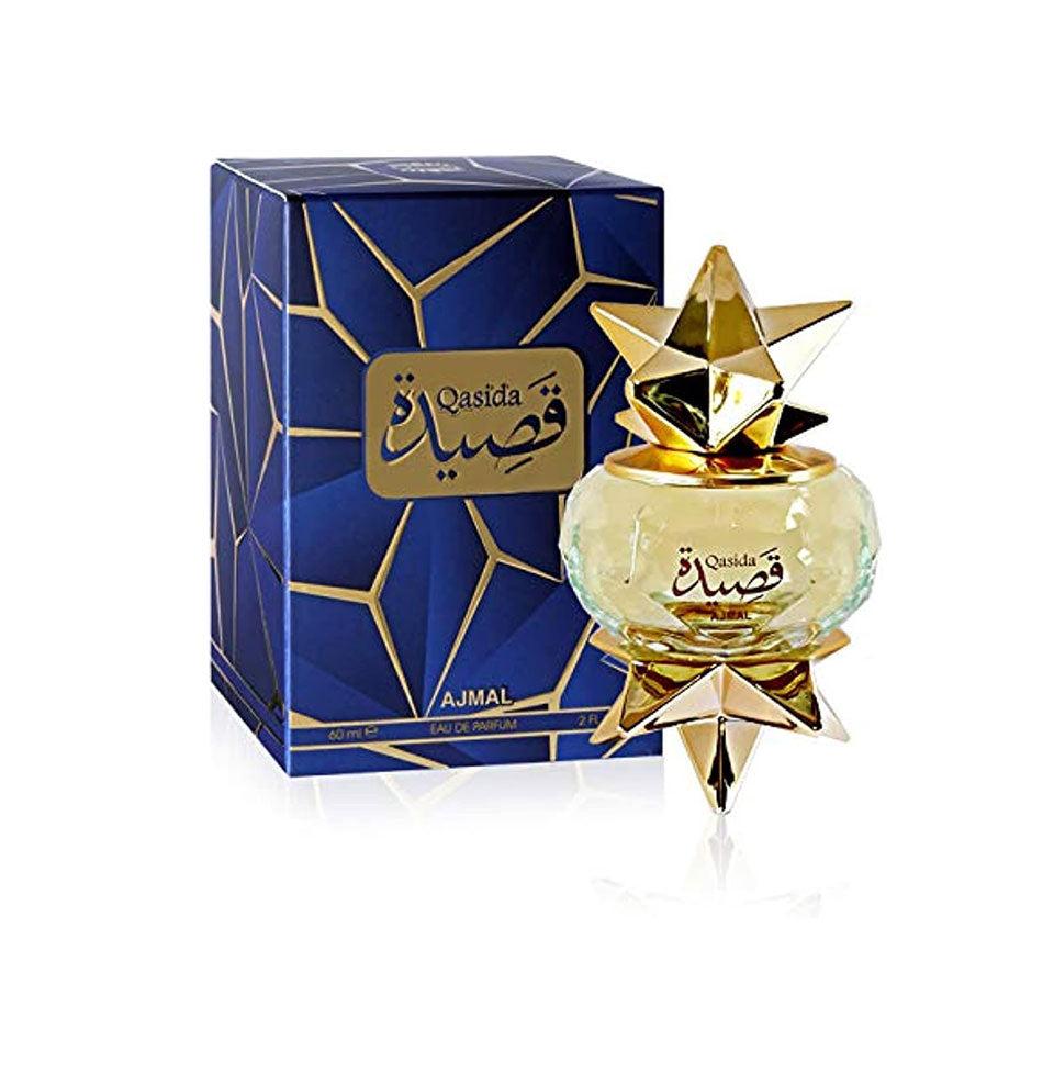 A 60ml bottle of AJMAL QASIDA EAU DE PARFUM FOR MEN & WOMEN with Arabic script, gold star-shaped cap and base is displayed next to a blue and gold geometric-patterned box featuring matching branding.