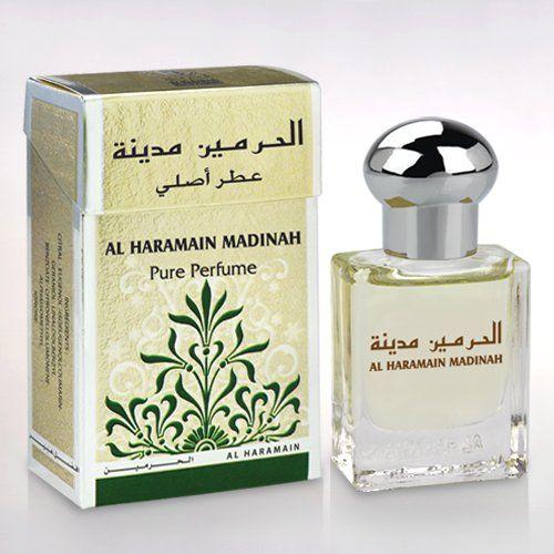Al Haramain Madinah Pure Perfume Roll-On Attar 15ml for men and women, featuring elegant glass bottle and floral fragrance.