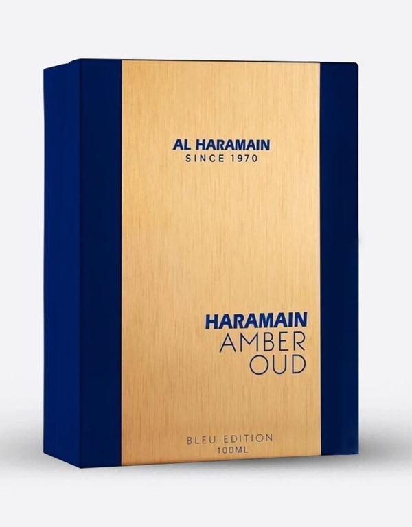 Al Haramain Amber Oud Bleu Edition Eau de Parfum bottle for men and women, featuring a sleek glass design with a golden cap.