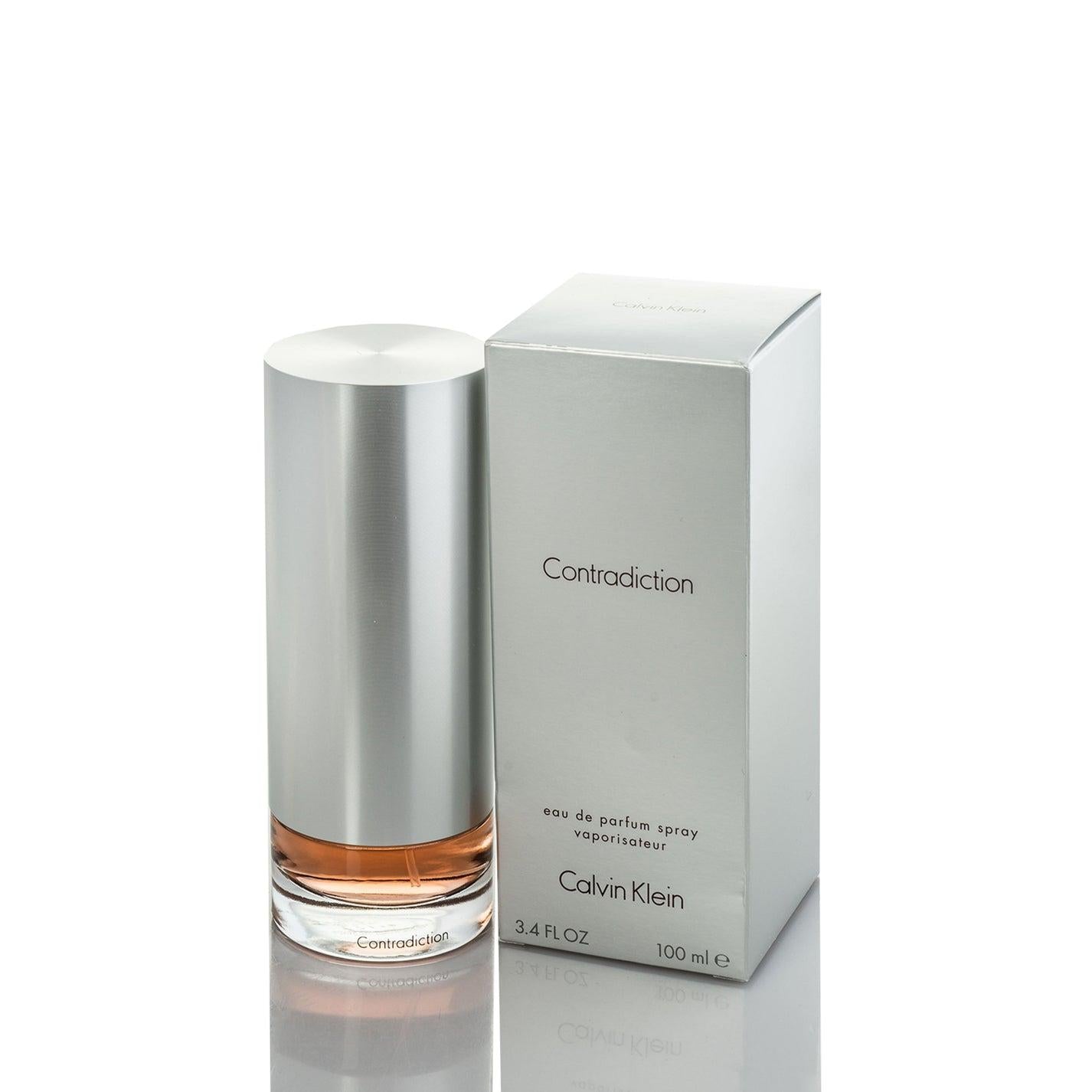 Calvin Klein Contradiction Eau de Parfum for women, 100ml bottle with elegant glass design and floral fragrance details.