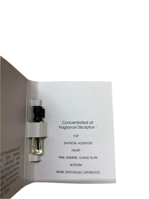 Ahmed Al Maghribi Aswad concentrated perfume oil vial for men and women, 1ml, showcasing the dark fragrance liquid in a small bottle.