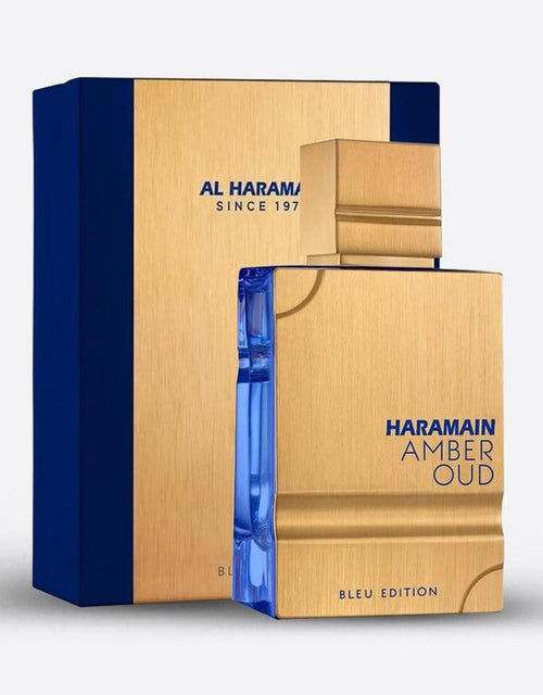 Al Haramain Amber Oud Bleu Edition 60ml EDP for men, featuring a sleek bottle with amber and blue accents.