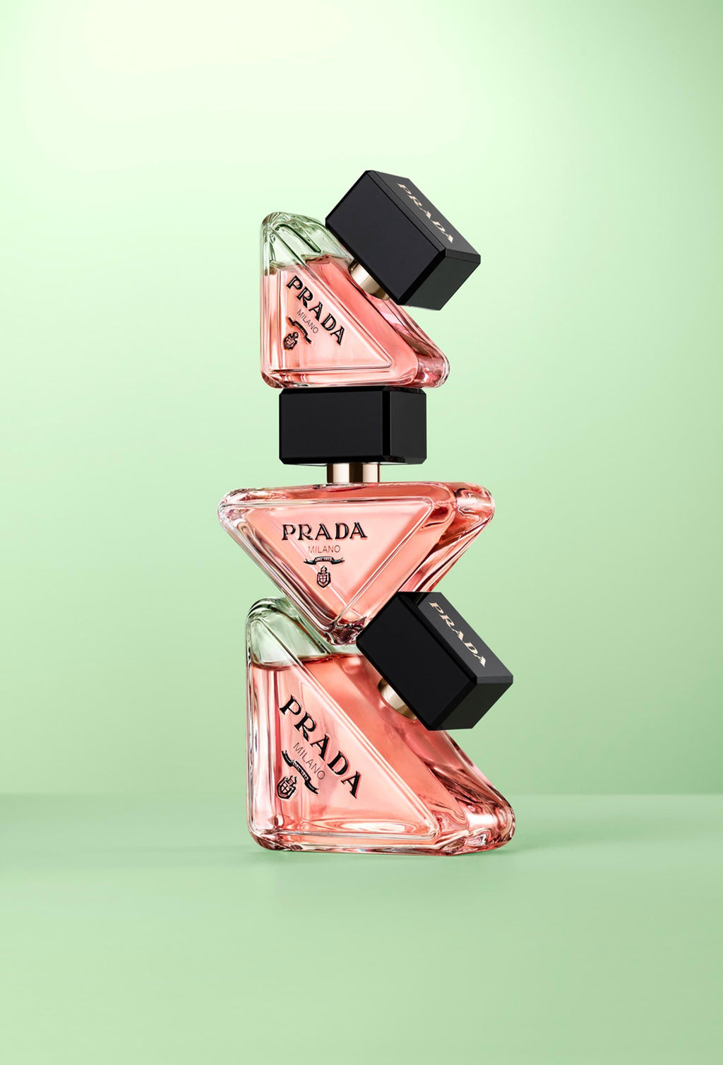Prada Paradoxe Eau De Parfum 90ml bottle for women, elegant glass perfume bottle with a sleek design and silver cap.