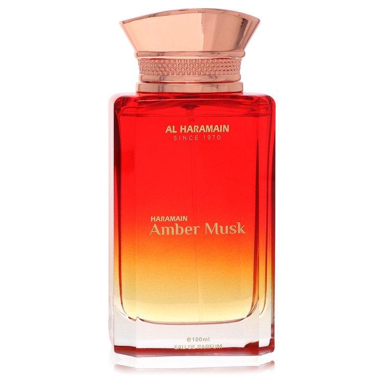 Al Haramain Amber Musk 100ml Eau de Parfum for men and women, bottle with amber-colored liquid and elegant branding.