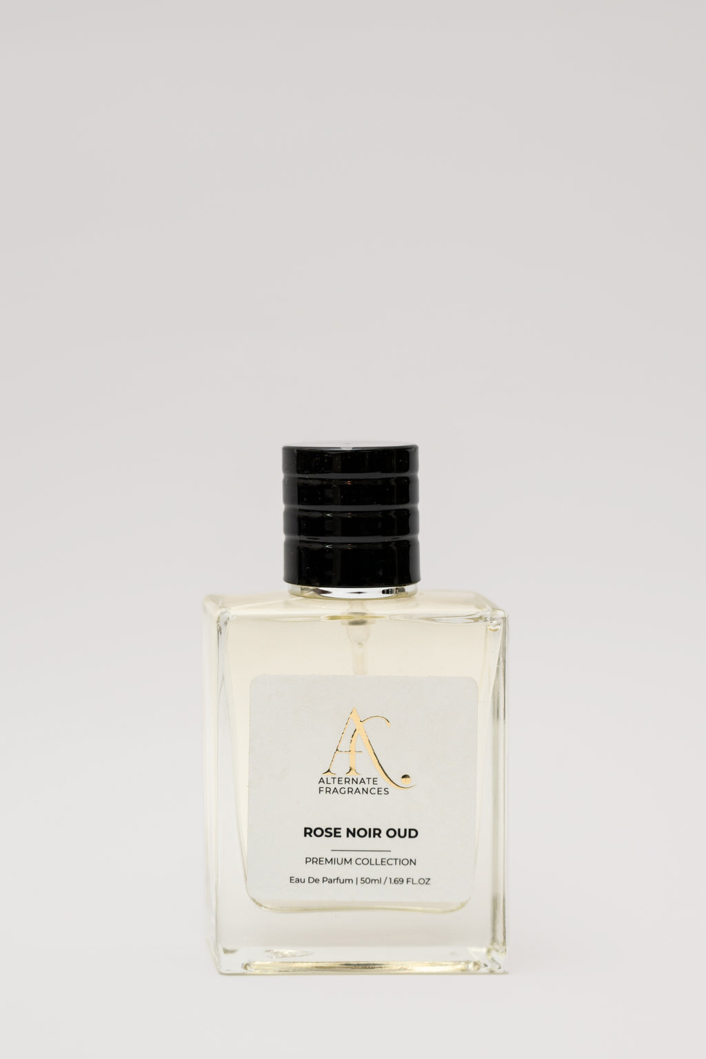 Elegant bottle of Rini Deals Rose Noir Oud EDP perfume with a dark floral and oud scent in a sleek glass bottle.