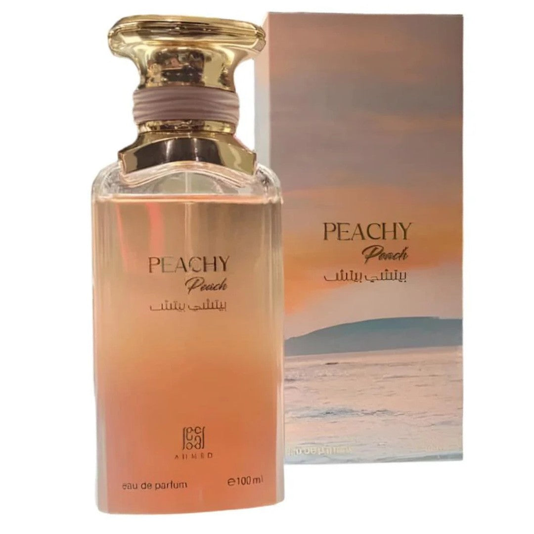 Ahmed Al Maghribi Peachy Peach Eau de Parfum for men and women, 100ml bottle with peach-colored liquid and elegant packaging.