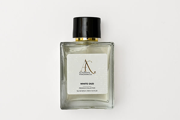 White Oud EDP by Rini Deals in 100ml bottle, showcasing the elegant white fragrance bottle with a minimalist design.