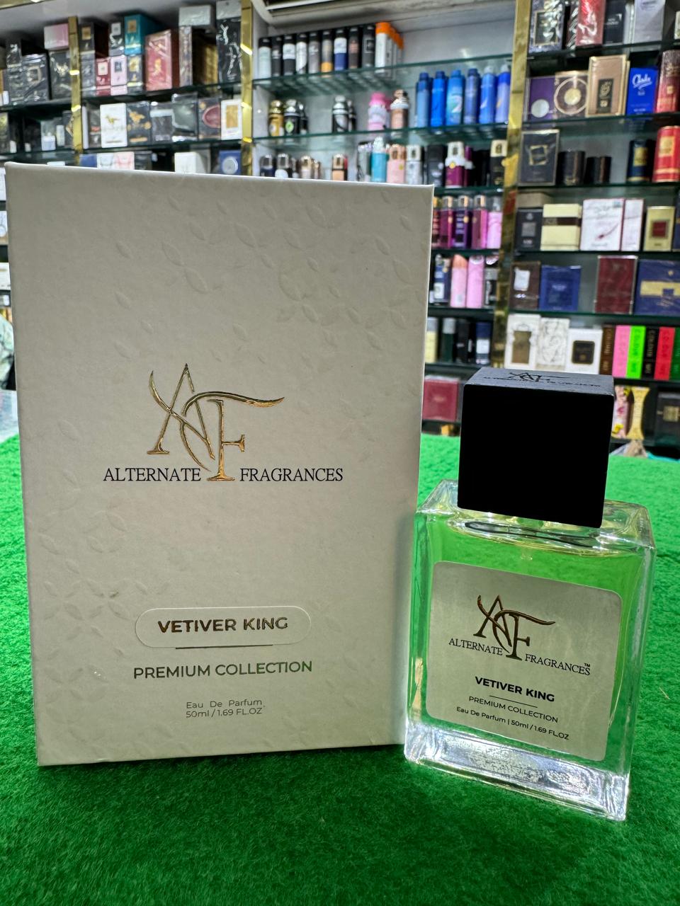 VETIVER KING EDP 50ml perfume bottle from Rini Deals, featuring a sleek design with amber-colored fragrance liquid visible inside.