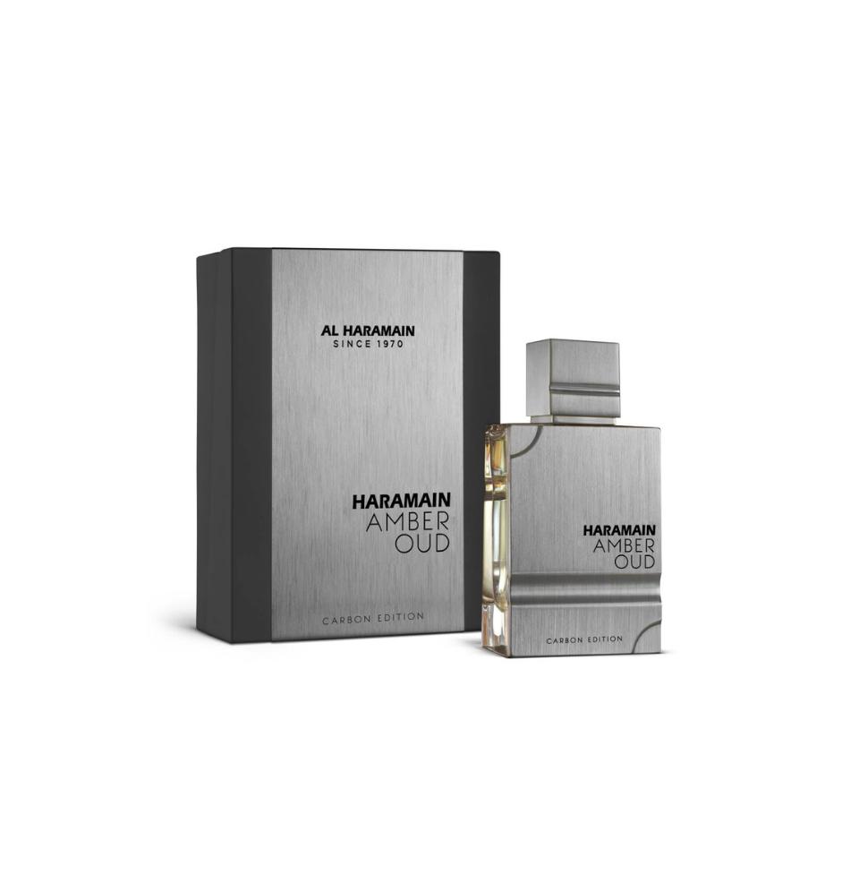 Al Haramain Amber Oud Carbon Edition Eau de Parfum bottle for men and women, showcasing the sleek 60ml glass design.