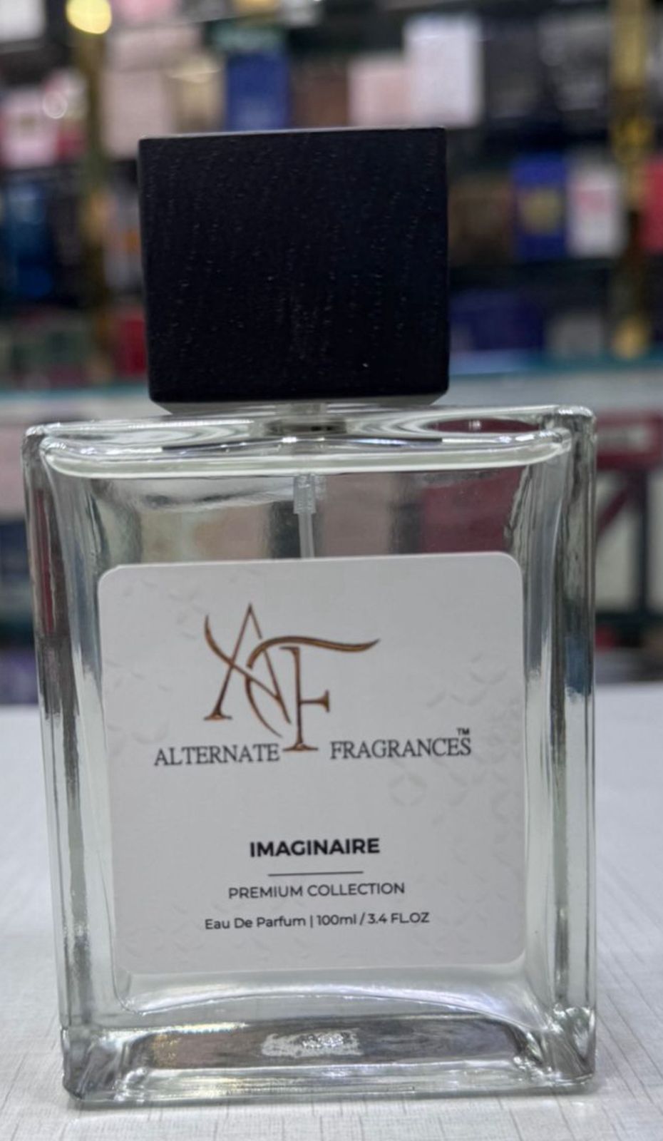 Imaginaire for Men fragrance by Rini Deals, featuring a sleek bottle with a modern design and a sophisticated scent profile.