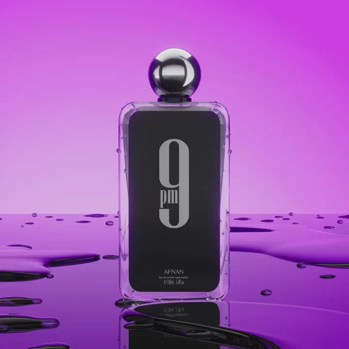Afnan 9PM Femme Eau De Parfum bottle for women, 100ml, with elegant packaging and floral design visible in the image.