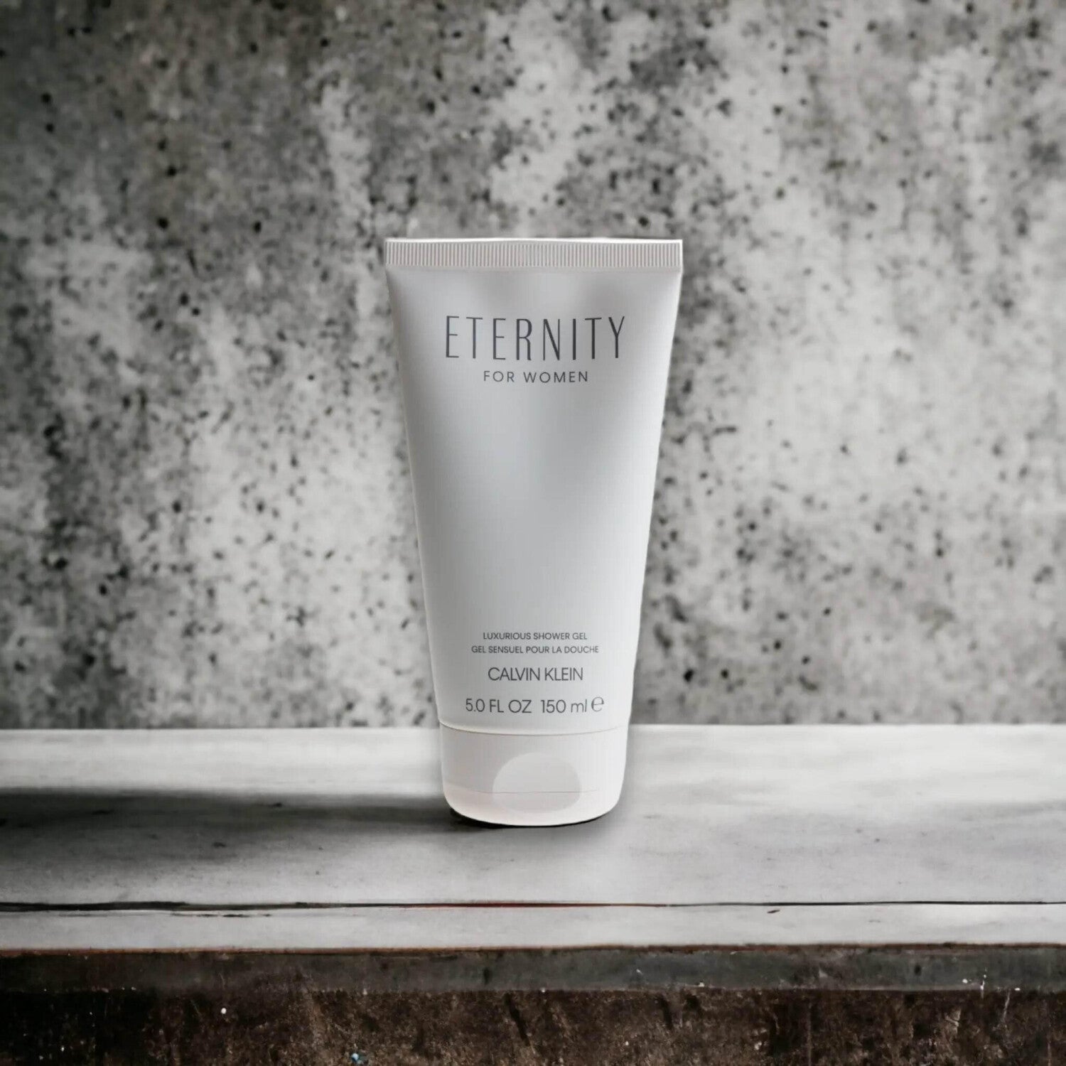 Calvin Klein CK Eternity shower gel for women in a 150ml bottle, with a sleek, minimalist design and clear label.