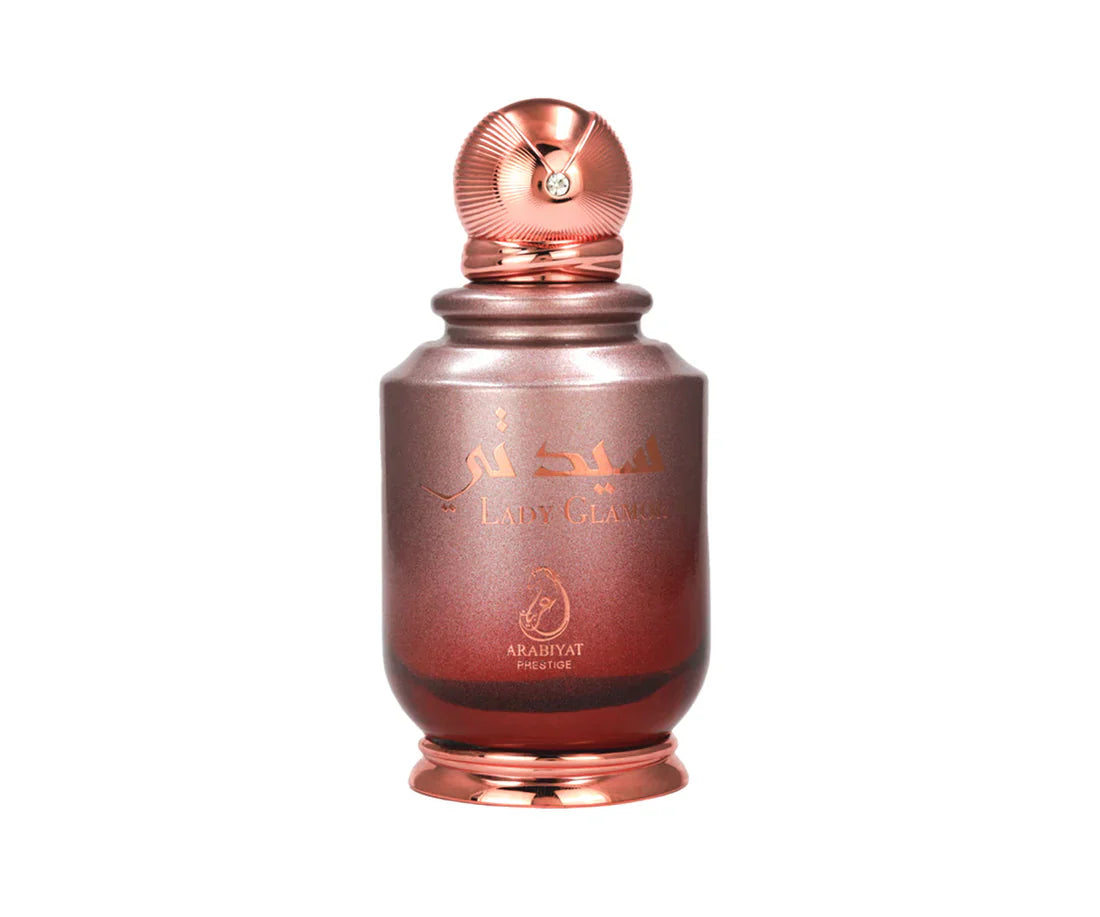 Arabiyat Prestige Lady Glamor Eau De Parfum 100ml bottle for women, elegant glass perfume bottle with floral design and gold accents.