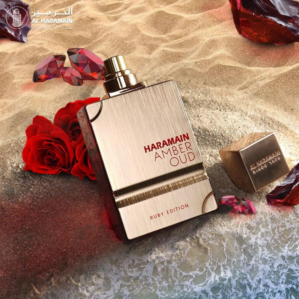 Al Haramain Amber Oudh Ruby Edition perfume bottle for men and women, elegant glass container with gold accents and rich amber scent.