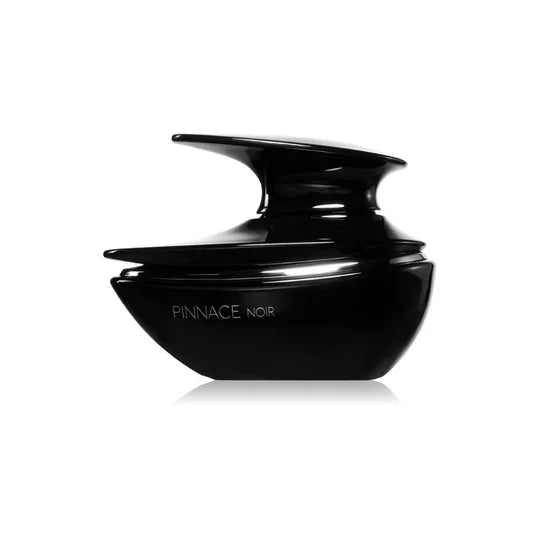 French Avenue Pinnace Noir Eau de Parfum for Men in a sleek glass bottle with black accents and a minimalist design.