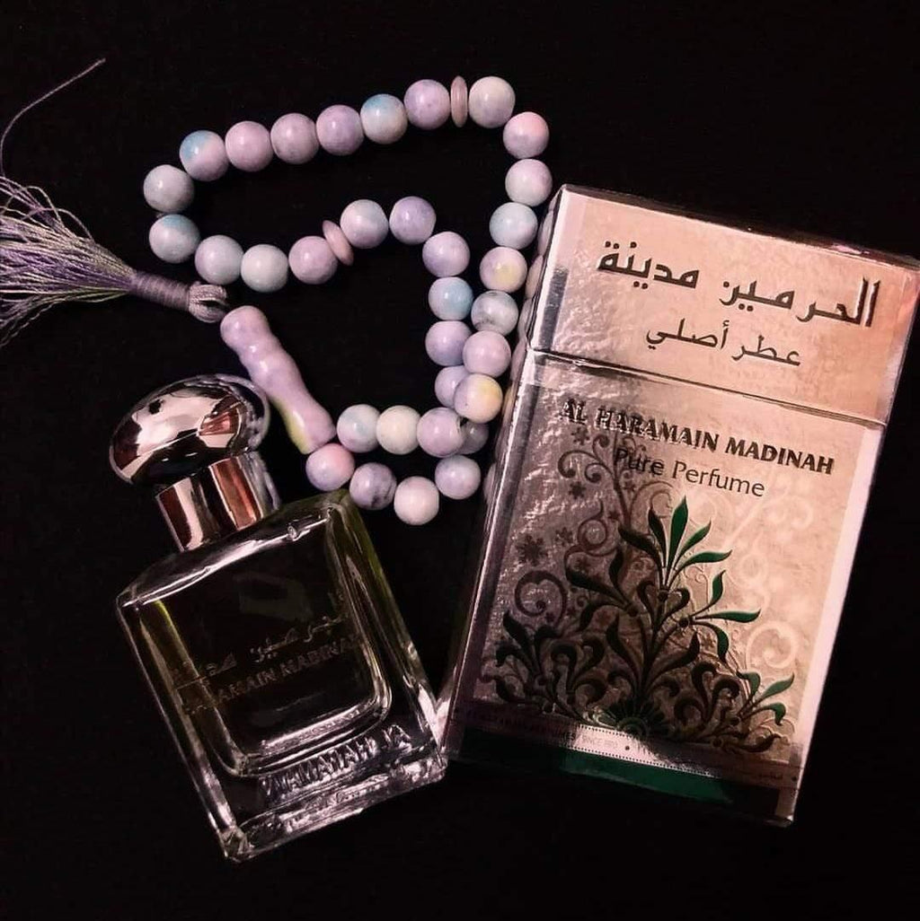 Al Haramain Madinah Pure Perfume Roll-On Attar in 15ml bottle, suitable for men and women, with a sleek, elegant design.