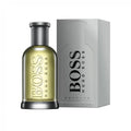 BOSS Bottled Eau De Toilette 100ml for men, glass bottle with black cap and label, showcasing the classic fragrance design.