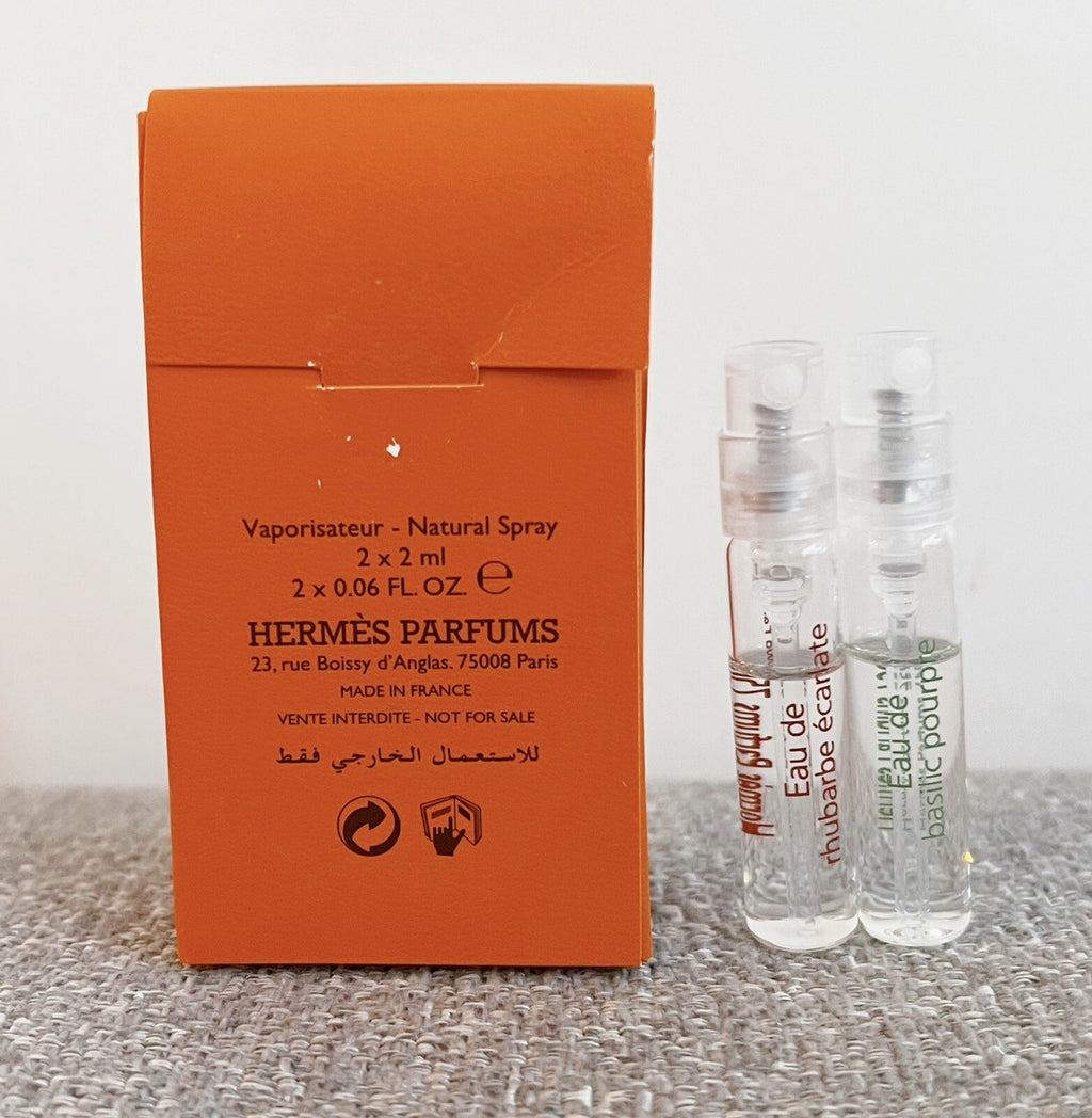 Miniature Hermès Eau De Parfum unisex mini spray set with two 2ml natural spray bottles on a white background.