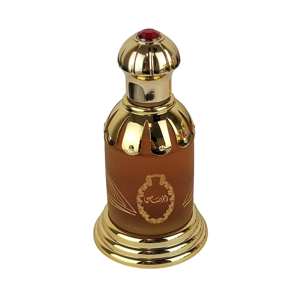 Rasasi Attar Al Oudh concentrated perfume oil in a 20ml bottle, suitable for men and women, with elegant packaging.