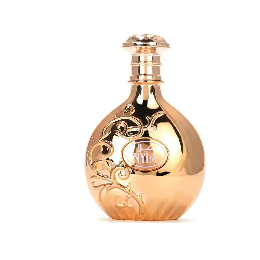 Arabiyat Prestige Nyla Eau De Parfum bottle for men and women, featuring elegant glass design and fragrance details.
