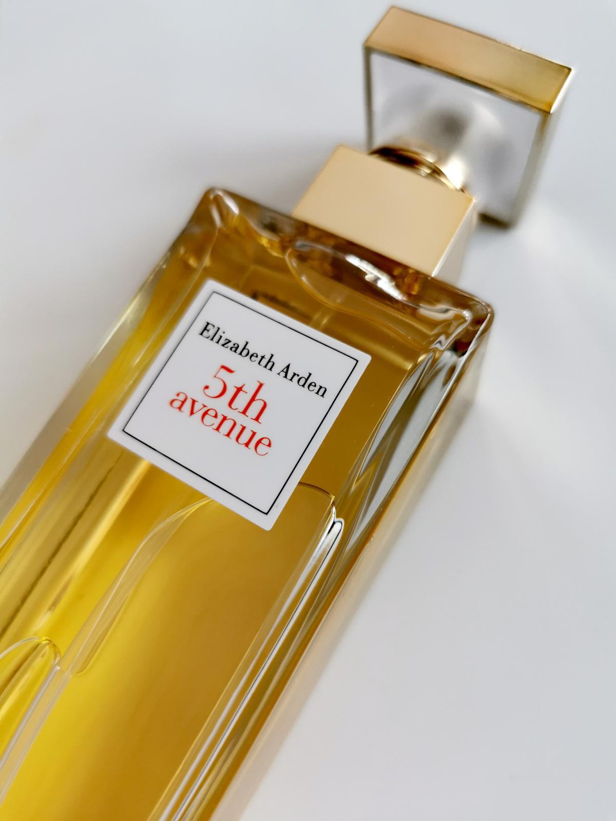 Elizabeth Arden 5th Avenue Eau de Parfum 125ml bottle for women, elegant glass bottle with a gold cap and floral accents.