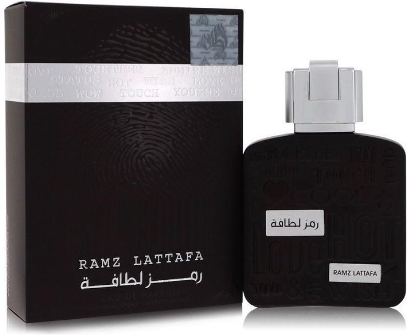 Lattafa Ramz Eau De Parfum 100ml unisex bottle with elegant design, showcasing the fragrance and brand logo.